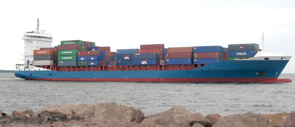 A short sea shipping container ship travels a seaway